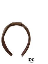 SERRE-TÊTE /180€